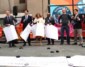 The Today Show Team Helps Lincoln Peirce break the World Record for the Longest Cartoon Strip by a Team. 