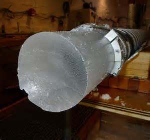 Ice core still in the drill head at NEEM site. Photo by Sepp Kipfstuhl