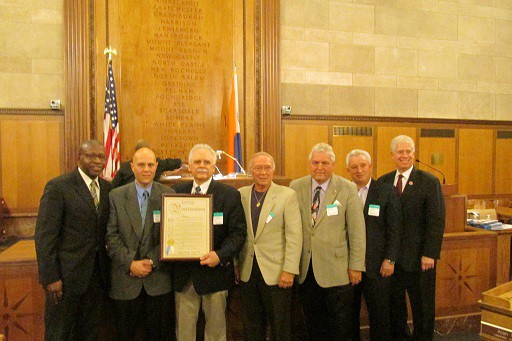 The members of Guardia Lombardi Association, joined by Hon. Lindon D. Williams and Hon. Michael B. Kaplowitz, proudly show their Proclamation.