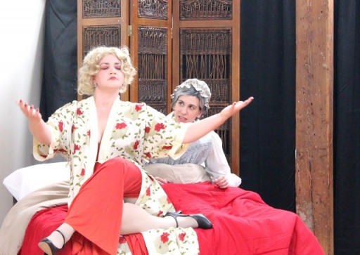 Mae West (Brigette Estola, left) attempts to commune with the spirit of Leo Tolstoy to help give peace to his widow, Sophia (Kirsten Egenes) in Bad Quarto Productions’ 2017 production of Anna Karenina Lives! By Germaine Shames. Directed by Tony Tambasco. Costumes by Joanne Famiglietti. Photo by James M. Smith.