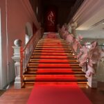 The red carpet stairway at the exibition Fashioning Singapore and the world