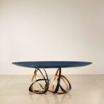 TABLE BASSE VOLUBILE, bronze lacquered wood top by Hervé Van Der Straeten