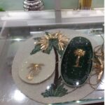 Piatti decorati con palme, Photo © Anna & Maria Sciacca
